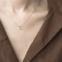 Золота каблучка з фіанітом.