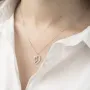 Золоте кольє Ніжки з фіанітами.
