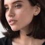Золоті сережки-підвіски з фіанітами.