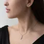 Золотий хрестик з діамантами і фіанітами.