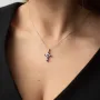 Золотий хрестик з сапфіром і діамантами.