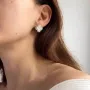 Золоті сережки з аметистом і фіанітами.