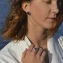 Золоті сережки з аметистом і фіанітами.