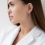 Золоті сережки з аметистом і фіанітами.