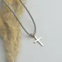 Золотий маленький хрестик.