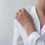Золотий браслет з фіанітами.