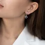 Золоті сережки з аметистом і фіанітами.