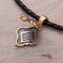 Серебряный мощевик с позолотой 132355 Оникс
