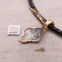Серебряный мощевик с позолотой 132355 Оникс