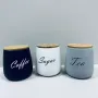 Набір керамічних банок з бамбуковими кришками BonaDi 304-034 Sugar/Tea/Coffee 3 шт 11,5х11,5х13 см 1 л Різнокольоровий (23523)